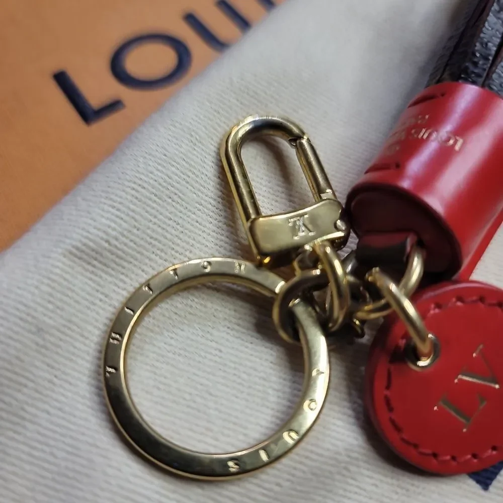 Louis Vuitton Leather Tassel Keychain In EUC FULL INCLUSION